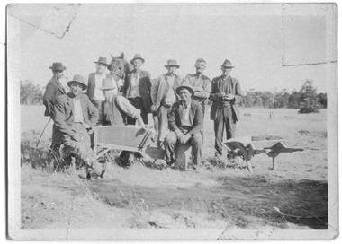 Photograph: Men with horse and wooden barrows, c.1930s?