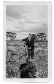 Photograph: William Graham at the windlass, 1950