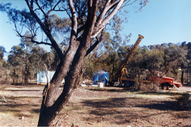 Photograph: Marquees and drill at mining exploration site