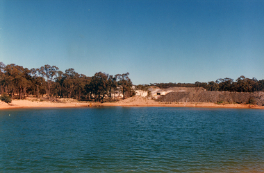 Photograph: View across settling pond at mine site