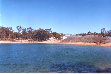 Photograph: View across settling pond at mine site