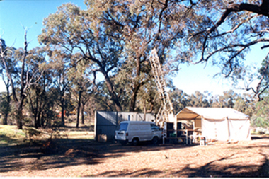 Photograph: Van, drill and marquee at mine site