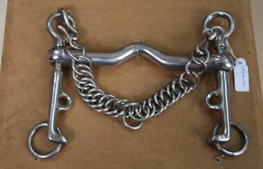 Nickel plated horse bit with chain used as equestrian accessory