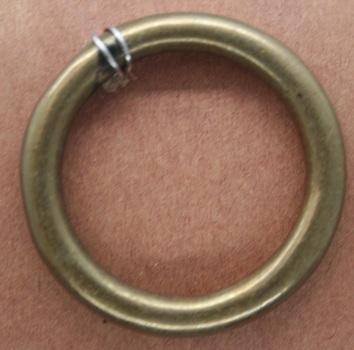 Brass ring for use in equine equipment