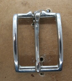 Nickel plated half buckle used as equine accessory