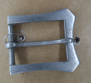 Nickle buckle half used circa 1900