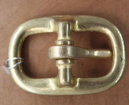 Brass full buckle used as equestrian accessory