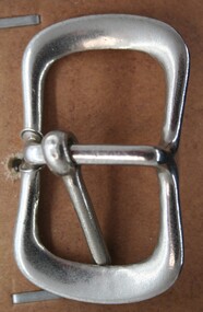 Nickel plated buckle used as equine accessory