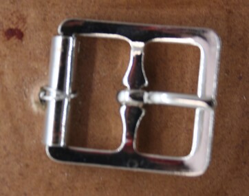 Nickel plated roller buckle used as equine accessory