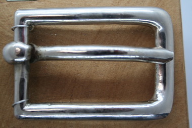 Nickel plated brass buckle used as an equestrian accessory