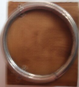 Nickel plated steel ring imported and used in the manafacrure of Horse gear by Holden and Frost C1900
