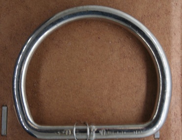 Bright steel D shaped ring for girth strap on horse equipment
