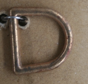 Brass D ring as used by Holden and Frost in the construction of pieces of equine equipment