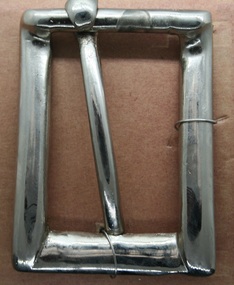 Nickle plated steel half buckle as imported, used and sold by Holden and frost Ca1900
