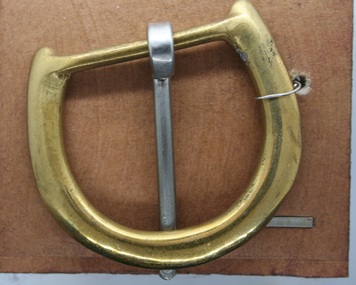 Brass half buckle with steel tongue as imported and used by Holden and Frost Ca 1900