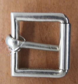 Nickel plated roller buckle used as an equestrian accessory