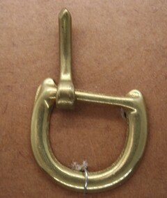 Horse shoe shaped half buckle used on equine accessories