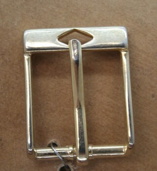 Brass half buckle used as an equine  accessory
