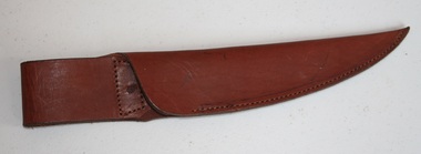 Brown leather belt mounted "dagger" knife scabbard as made by Holden and Frost