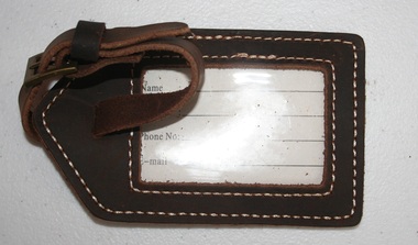 Leather label tag with strap