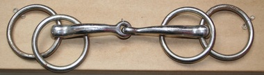 Nickle plated brass snaffle bit, comprising four rings