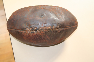 Leather Australian rules football, laced on top