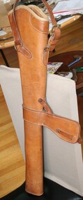 Saddle mount gun case manufactured by Holden and Frost