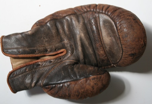 Brown leather boxing gloves made and sold by Holden and Frost