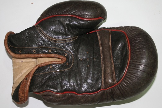 Brown leather boxing gloves as manufactured by Holden and Frost C1900