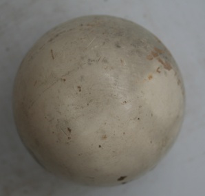 Round white equestrian polo ball imported by Holden and Frost