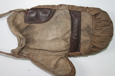 Childs sized boxing glove, made from leather and fabric by Holden and Frost Ca 1900