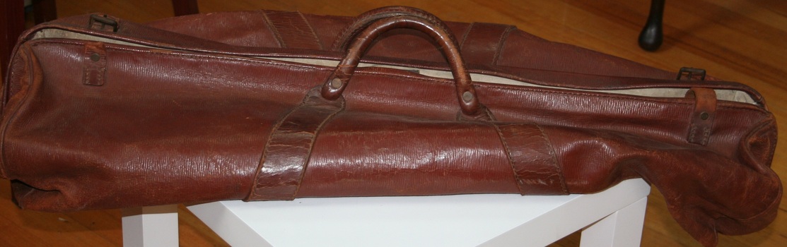 Brown leather cricket equipment carry bag manufactured by Holden and Frost