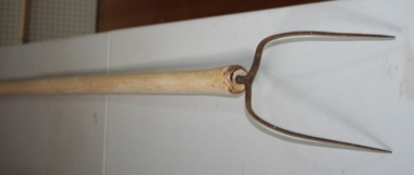 Two pronged wooden handled pitch fork as sold by Holden and Frost