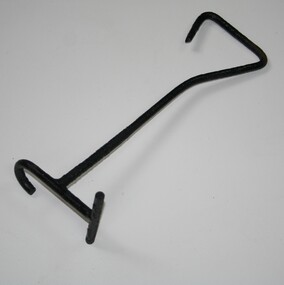 Steel branding iron for marking stock as to ownership.
