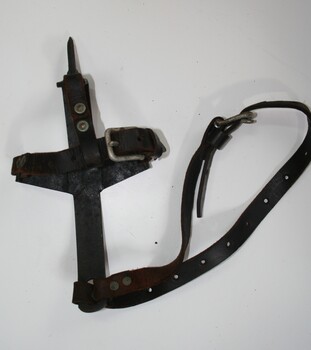 metal foot spikes used by tree loppers in conjunction with belt, for lopping tall trees imported by HOLDEN and FROST Ca 1910