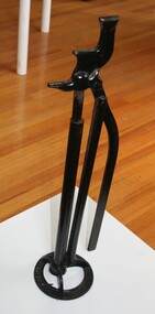 Steel carriage jack used to facilitate repairs under buggy