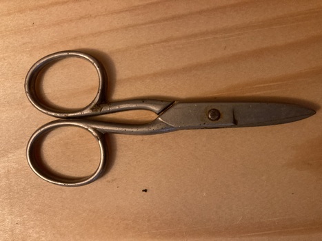 Used by seamstresses for "finishing" garments as, trimming cottons and threads.