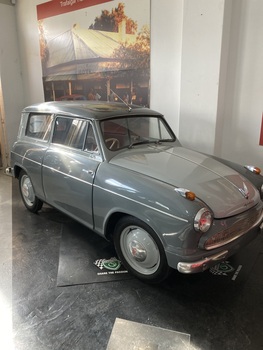 Two door estate vehicle painted two tone grey.