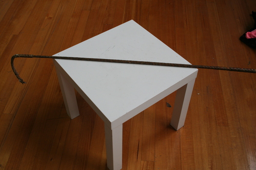 Buggy whip. Cane centre with plaited leather outer, plaited whip end.