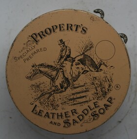 round squat tin can with instructions printed on outer 