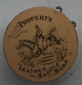 Squat round tin, with instructions printed on outer