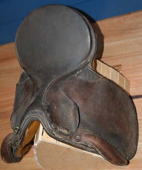 Brown equine saddle used by riders circa 1900