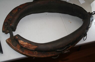 Wood, leather with straw filling, horse collar