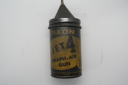 Container for holding graphite, can be used with air pressure to lubricate objects