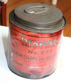 Red painted tin with screw lid for holding graphite grease