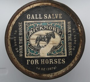 Squat round tin with label printed on lid. Tin contains Gall salve.