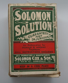 Small cardboard box containing   Solomon's Solution, label stating its beneficial uses on animals and humans.