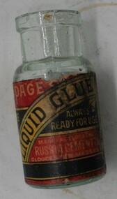 Small bottle containing Le Pages Liquid Glue with red paper label