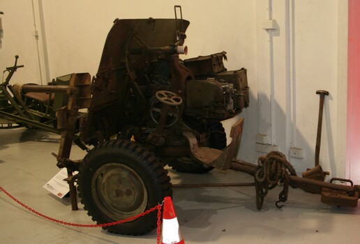 Two pound anti tank gun on carriage painted military olive green