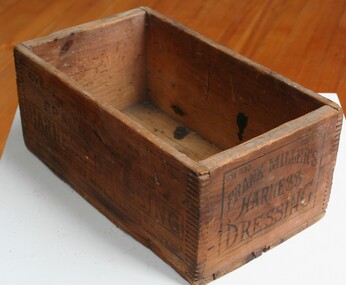 Brown wooden box without lid